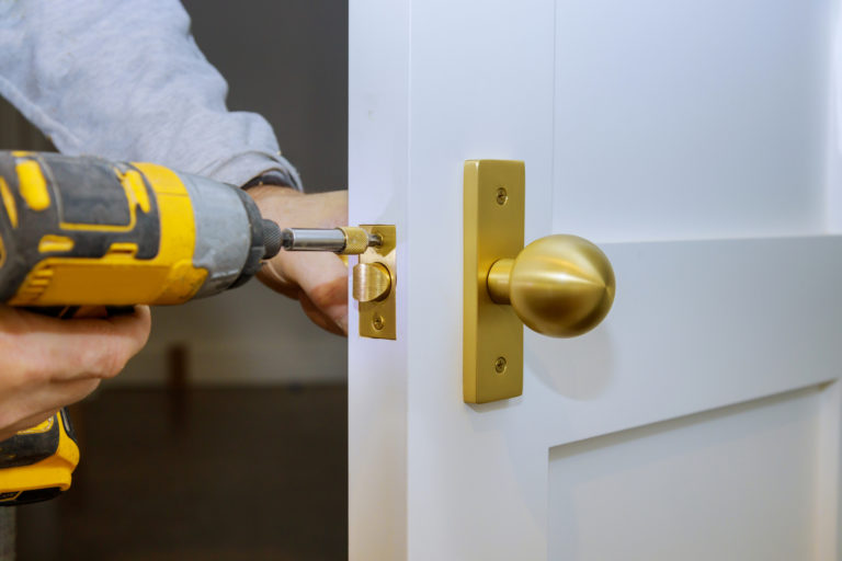 man drilling locks commercial locksmith services in maitland, fl – dependable and swift locksmith services for your office and business